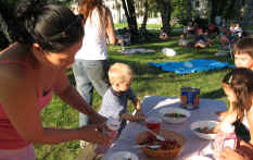 Mom helps with the sundaes