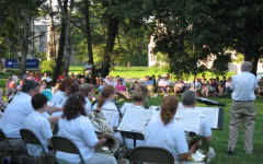 Ensemble with crowd in background