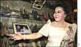 Imelda Marcos with her shoes