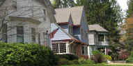 A row of Victorian homes on the west side of Kenyon Street